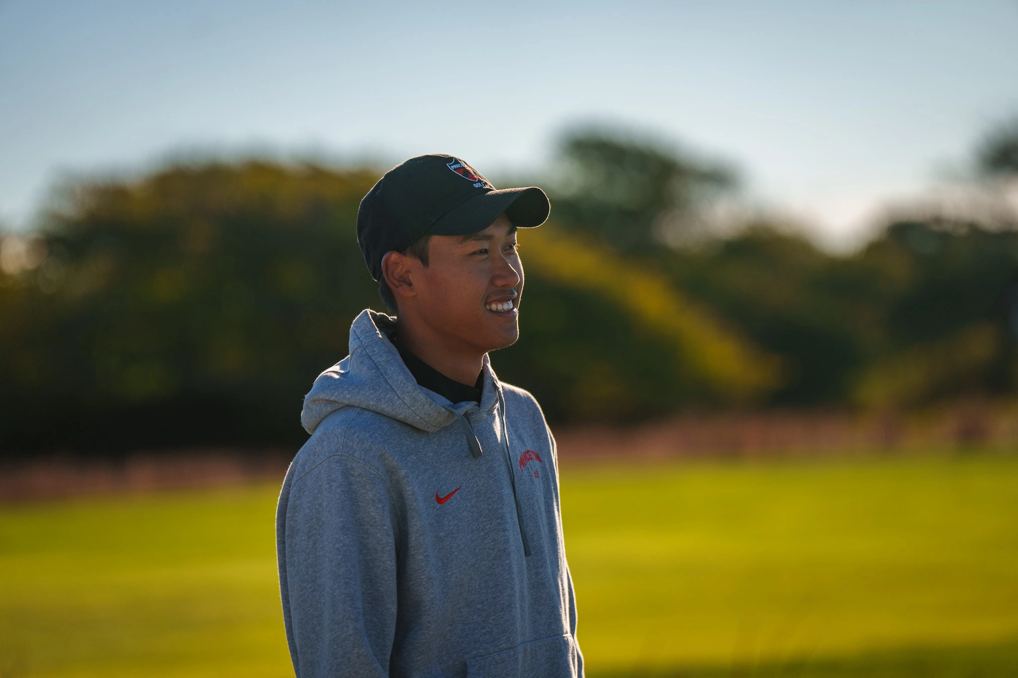 Will Huang outdoors on a golf course